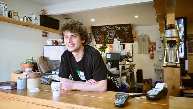 Happy coffee shop employee
